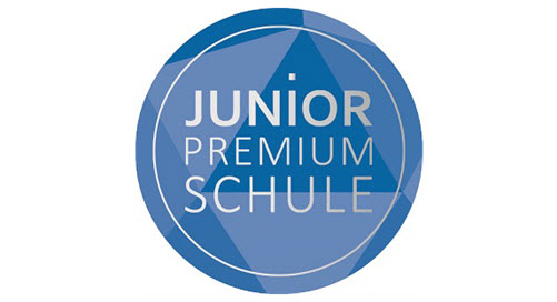 Logo des JUNIOR Premium Schule-Siegels, Aufschrift: JUNIOR Premium Schule